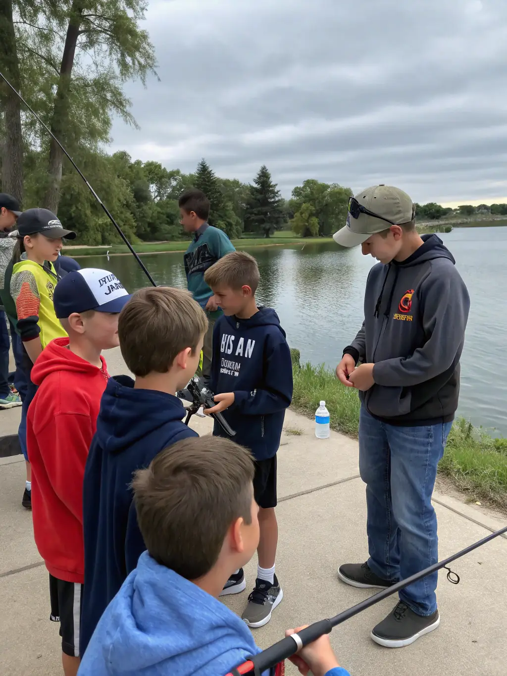 An image of children participating in a fishing workshop, learning about sustainable fishing practices and the importance of conserving aquatic resources.
